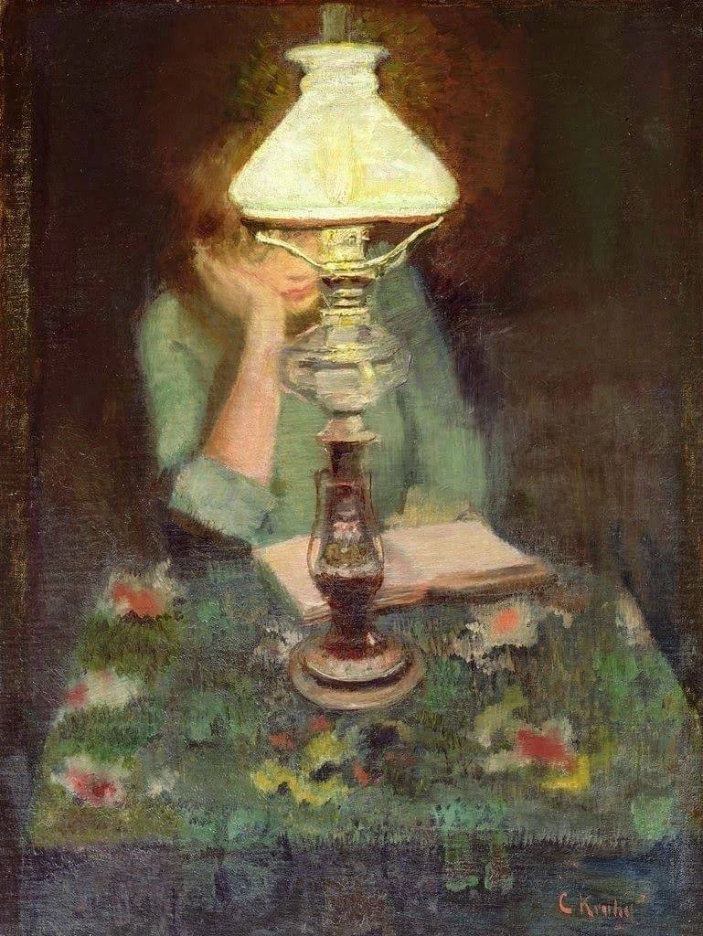 Oda legge alla luce della lampada